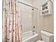 Cozy bathroom with tub-shower combination and seashell-themed shower curtain at 1320 W Whitman Dr, Anthem, AZ 85086