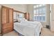 Comfortable bedroom with built-in wardrobe and bright natural light from shuttered windows at 1320 W Whitman Dr, Anthem, AZ 85086