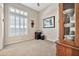Carpeted bedroom with shuttered windows and built in hutch at 1320 W Whitman Dr, Anthem, AZ 85086