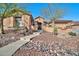 Welcoming front entrance with desert landscaping, and a secure front entry door at 1320 W Whitman Dr, Anthem, AZ 85086
