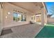 Spacious covered patio featuring brick flooring, neutral walls, and outdoor seating at 1320 W Whitman Dr, Anthem, AZ 85086