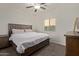 Comfortable bedroom featuring a ceiling fan, carpet, and a window for natural light at 1329 W Crape Rd, Queen Creek, AZ 85140