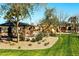 Beautiful community park featuring a covered picnic area and a colorful playground for children at 1329 W Crape Rd, Queen Creek, AZ 85140