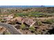 Desert home with a red tile roof, near a golf course with mountain views at 13827 N Sunset Dr, Fountain Hills, AZ 85268