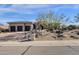 Charming single-story home features a three-car garage and desert landscaping at 13827 N Sunset Dr, Fountain Hills, AZ 85268