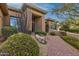 Charming front yard featuring colorful flowers and shrubbery leading to the front entrance at 13827 N Sunset Dr, Fountain Hills, AZ 85268