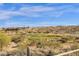 Expansive golf course view with lush greenery and a tranquil pond at 13827 N Sunset Dr, Fountain Hills, AZ 85268