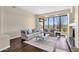 Bright living room features large windows with mountain views at 13827 N Sunset Dr, Fountain Hills, AZ 85268