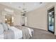 Bright main bedroom featuring a walk-out to balcony and en suite bathroom at 13827 N Sunset Dr, Fountain Hills, AZ 85268