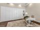 Bright office with custom built-ins, stylish desk, and natural light from a side window at 13827 N Sunset Dr, Fountain Hills, AZ 85268