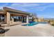 The spacious backyard features an inviting pool, offering a tranquil outdoor oasis for relaxation and recreation at 13827 N Sunset Dr, Fountain Hills, AZ 85268