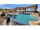 This home features a luxurious pool with rock waterfall, perfect for relaxation, and enjoying the desert view at 13827 N Sunset Dr, Fountain Hills, AZ 85268