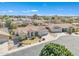 Beautiful aerial view of a home with a well-manicured front yard and a three-car garage in a nice neighborhood at 14955 N 78Th Dr, Peoria, AZ 85381