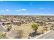 Nice aerial view of a home in a quiet neighborhood with a green space and mountain views at 14955 N 78Th Dr, Peoria, AZ 85381