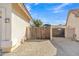 Home featuring a private backyard area with gated access at 14955 N 78Th Dr, Peoria, AZ 85381
