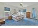 Bright bedroom with neutral walls, a ceiling fan and natural lighting at 14955 N 78Th Dr, Peoria, AZ 85381