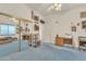 Bedroom featuring blue carpet, ceiling fan, and a mirrored closet at 14955 N 78Th Dr, Peoria, AZ 85381