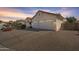 Spacious two-car garage and extended driveway on a well-maintained home at 14955 N 78Th Dr, Peoria, AZ 85381