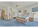 A serene main bedroom with a walk-in bathroom and calming decor at 14955 N 78Th Dr, Peoria, AZ 85381
