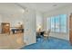 Bright office with a large window and classic wood desk at 14955 N 78Th Dr, Peoria, AZ 85381