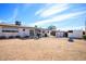 Large backyard ideal for activities and has additional storage sheds at 1510 S Lawther Dr, Apache Junction, AZ 85120