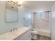 Bright bathroom with a shower over tub, modern vanity and updated fixtures at 1510 S Lawther Dr, Apache Junction, AZ 85120