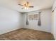 Cozy bedroom with plush carpeting and neutral walls, creating a relaxing space at 1510 S Lawther Dr, Apache Junction, AZ 85120