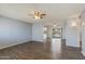 Spacious living room featuring wood-look floors and abundant natural light at 1510 S Lawther Dr, Apache Junction, AZ 85120