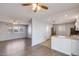 Open concept living room with sleek floors and kitchen access at 1510 S Lawther Dr, Apache Junction, AZ 85120
