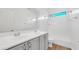 Bright bathroom featuring double sinks and white bathtub at 16966 W Rio Vista Ln, Goodyear, AZ 85338