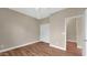 Bedroom with neutral walls, a ceiling fan, and closet at 16966 W Rio Vista Ln, Goodyear, AZ 85338