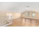 Bright upstairs bonus room featuring wood floors and lots of natural light at 16966 W Rio Vista Ln, Goodyear, AZ 85338