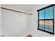 Well-lit walk-in closet with custom shelving and a window at 16966 W Rio Vista Ln, Goodyear, AZ 85338