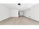 A large garage with painted concrete floor provides lots of room for parking and storage at 16966 W Rio Vista Ln, Goodyear, AZ 85338