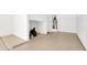 Spacious garage featuring painted concrete flooring and lots of room for storage at 16966 W Rio Vista Ln, Goodyear, AZ 85338