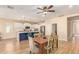 Open-concept kitchen flowing into the dining area, perfect for entertaining at 16966 W Rio Vista Ln, Goodyear, AZ 85338