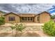 View of backyard with desert landscaping and open patio at 18618 E Mockingbird Dr, Queen Creek, AZ 85142