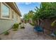 Backyard view with a serene sitting area and lush greenery, perfect for relaxation and outdoor enjoyment at 18635 W Miami St, Goodyear, AZ 85338
