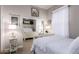 Bright bedroom with neutral colors, a comfortable bed, and mirrored closet at 18635 W Miami St, Goodyear, AZ 85338