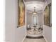 Charming entryway features decorative art, rug, and a view of the front door at 18635 W Miami St, Goodyear, AZ 85338
