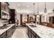 Lovely kitchen featuring granite island, stainless appliances and breakfast bar with seating at 18635 W Miami St, Goodyear, AZ 85338