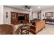 Well-appointed living room showcasing a built-in entertainment center and decorative accents at 18635 W Miami St, Goodyear, AZ 85338