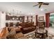 Inviting living room open to the kitchen features traditional decor and comfortable seating at 18635 W Miami St, Goodyear, AZ 85338