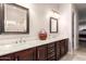 Beautiful bathroom with dual sinks, marble countertops, and ample cabinet space at 18635 W Miami St, Goodyear, AZ 85338