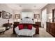Serene main bedroom with a luxurious bed, elegant decor, and ample natural light at 18635 W Miami St, Goodyear, AZ 85338