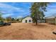 Expansive backyard featuring low maintenance gravel with rear house view and patio area at 18829 N 15Th Pl, Phoenix, AZ 85024