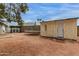 Backyard with a shed, trampoline, and built-in grilling area at 18829 N 15Th Pl, Phoenix, AZ 85024