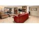 Cozy living room with tile floors, a large sliding glass door, and stylish furnishings at 19220 N 93Rd Ave, Peoria, AZ 85382
