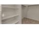 A well-organized closet with multiple shelves and hanging space for efficient storage at 19924 W Rancho Dr, Litchfield Park, AZ 85340