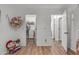 Neutral-toned bedroom featuring modern floors, closet, and decorated walls at 22491 W Woodlands Ave, Buckeye, AZ 85326
